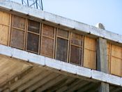 September 7, 2008: Plywood covers help control dust during the demolition of the tenth floor slab.