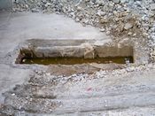 November 2, 2008: Small pit filled with water in the lowest slab of concrete.