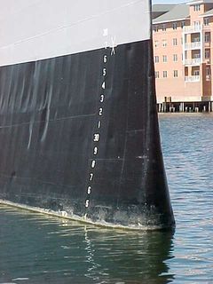These marks along the Wisconsin's bow indicate how deep the ship is floating at the moment. At the time of this photograph, she is floating 24 feet deep in the water.