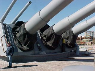 Look at the size of these gun turrets! Look at the turrets, and then compare their size to the man standing next to them.