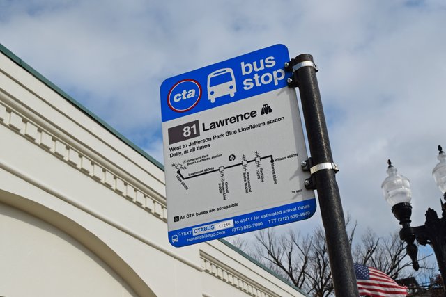 Bus stop sign along West Lawrence Avenue, going westbound.