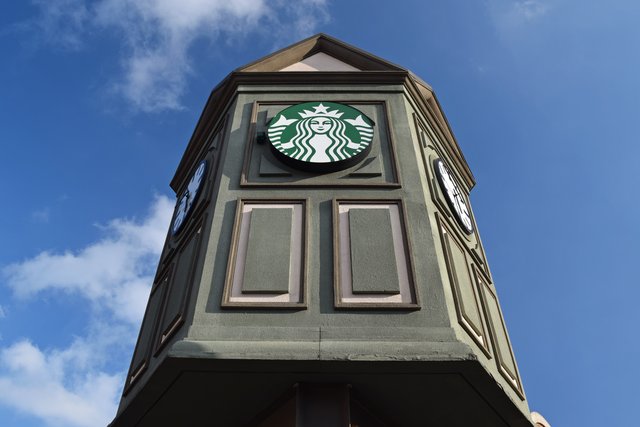 Tower above the entrance to Starbucks Coffee.